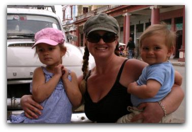 Corinne with kids in Cuba